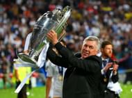 LISBON, PORTUGAL - MAY 24:  Head Coach, Carlo Ancelotti of Real Madrid celebrates with the Champions League trophy during the UEFA Champions League Final between Real Madrid and Atletico de Madrid at Estadio da Luz on May 24, 2014 in Lisbon, Portugal.  (Photo by Alex Livesey/Getty Images)